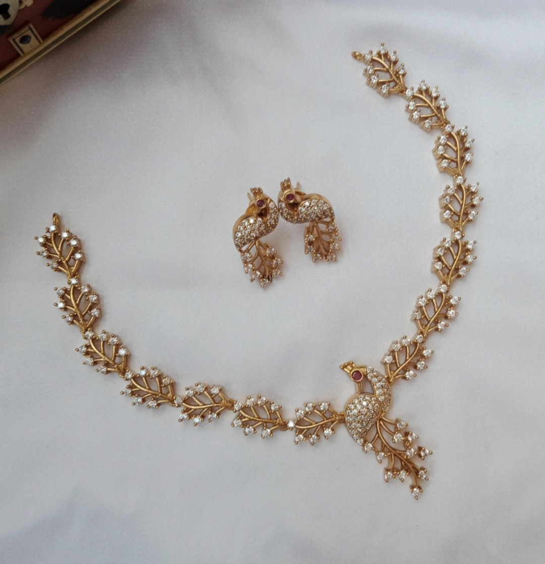 Screenshot_20260108_183238_Google Beautiful Peacock shape CZ necklace - Image 1