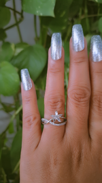 Silver f;ower shaped ring