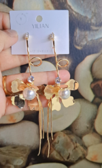 long flower with golden hangings