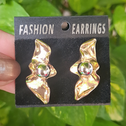 Gold and silver statement studs