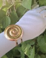 Spiral broad bracelet