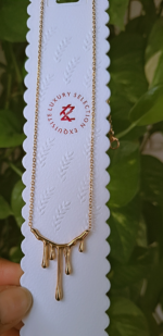 Melting charm pendent neckpiece